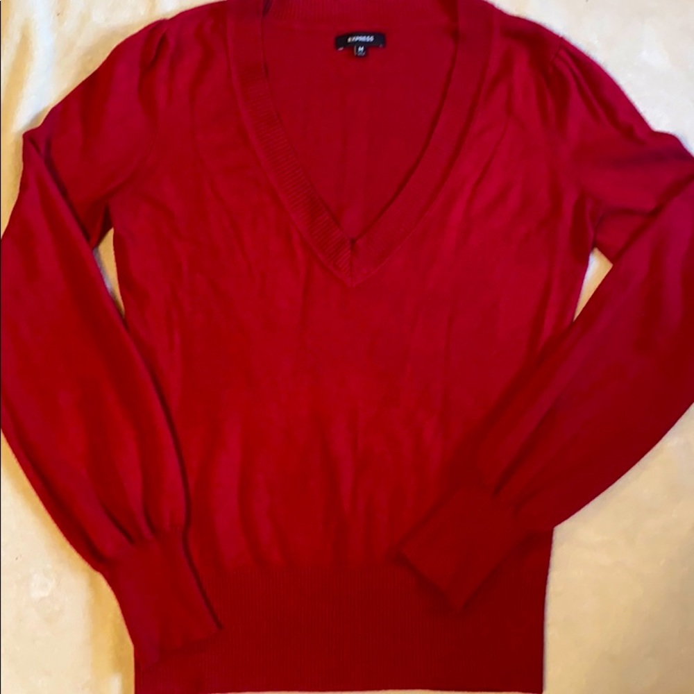 Red V-neck sweater